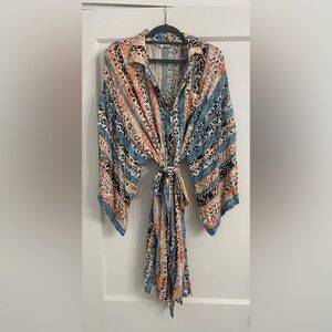 Cute summer belted dress.  Super soft size medium multi-color.